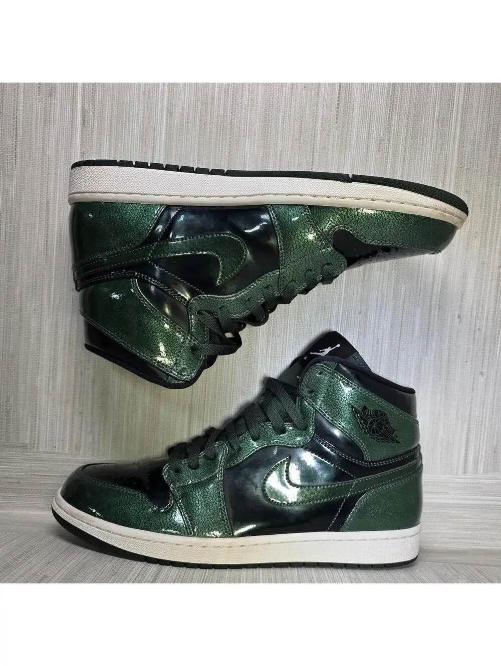 Nike Air Jordan 1 Retro High OG green trainers.